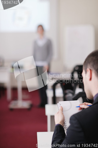 Image of business man on seminar