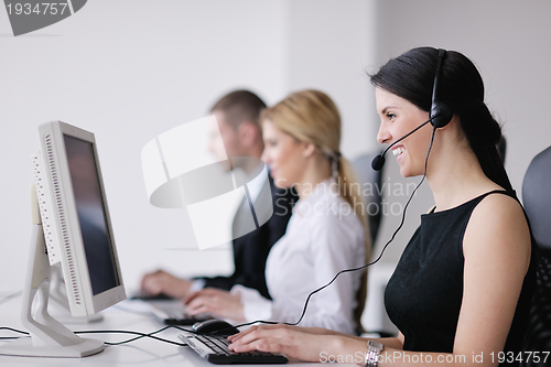 Image of business people group working in customer and help desk office