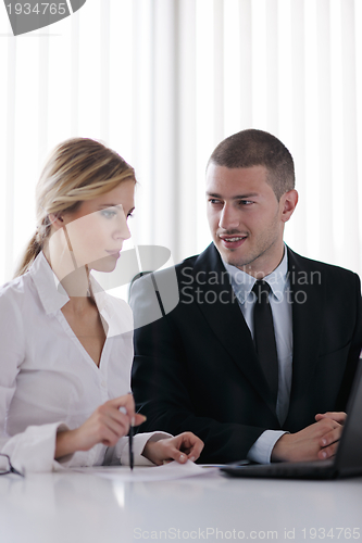 Image of business people in a meeting at office