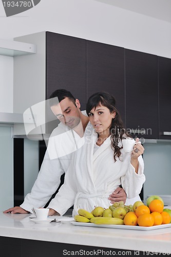 Image of young couple have fun in modern kitchen