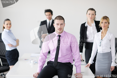 Image of young business man at meeting