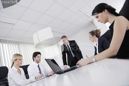 Image of business people in a meeting at office