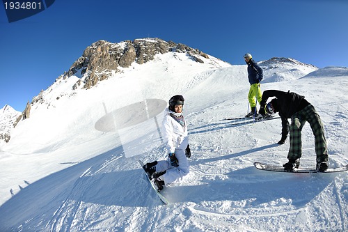 Image of people group on snow at winter season
