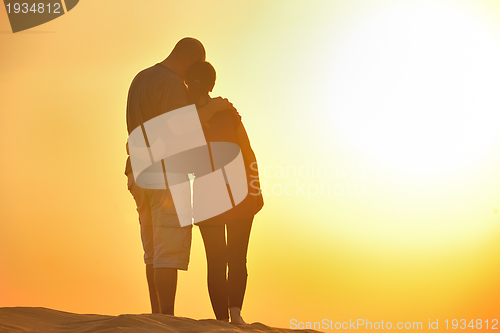Image of couple enjoying the sunset