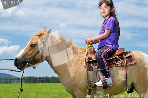 Image of child ride pony