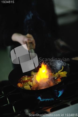 Image of chef preparing meal