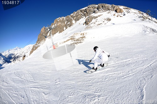 Image of skiing on fresh snow at winter season at beautiful sunny day