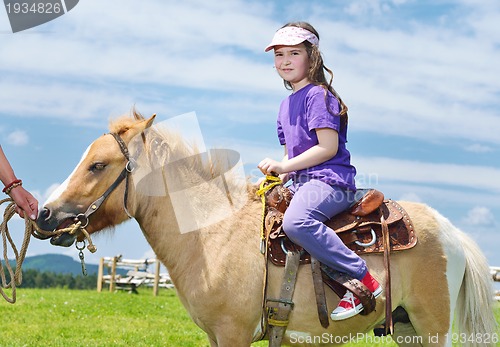 Image of child ride pony