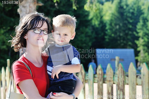 Image of woman and child have fun outdoor