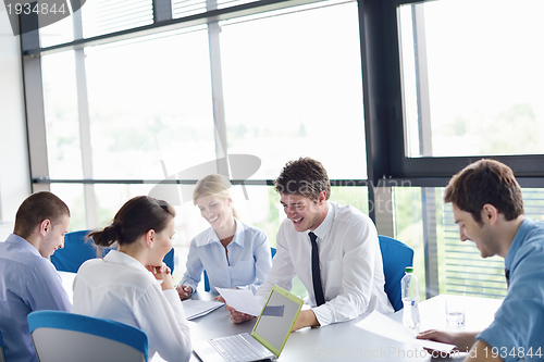 Image of business people in a meeting at office