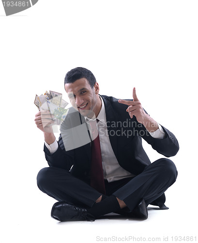 Image of Business man holding money