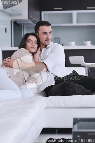 Image of happy young couple relax at home