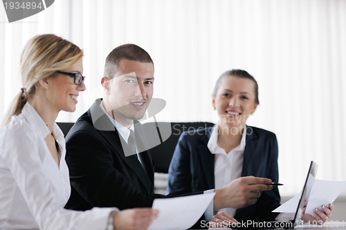 Image of business people in a meeting at office