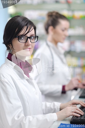 Image of team of pharmacist chemist woman  in pharmacy drugstore