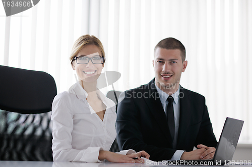 Image of business people in a meeting at office