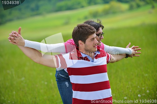 Image of romantic young couple in love together outdoor