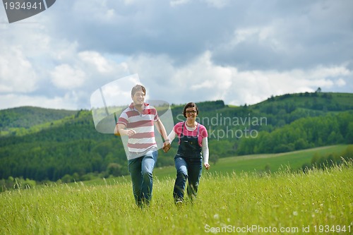 Image of romantic young couple in love together outdoor