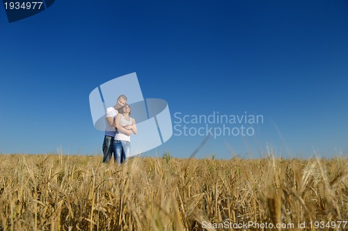 Image of happy couple in wheat field