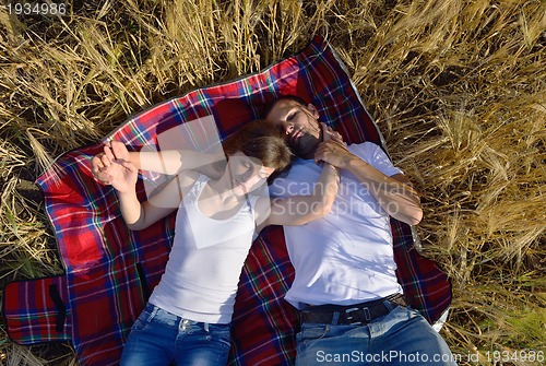 Image of happy couple in wheat field
