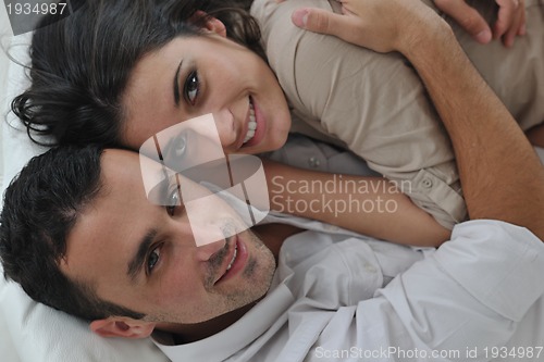 Image of happy young couple relax at home