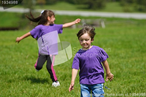 Image of happy kids group  have fun in nature