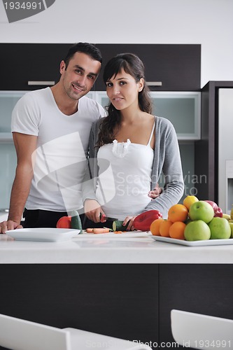 Image of young couple have fun in modern kitchen