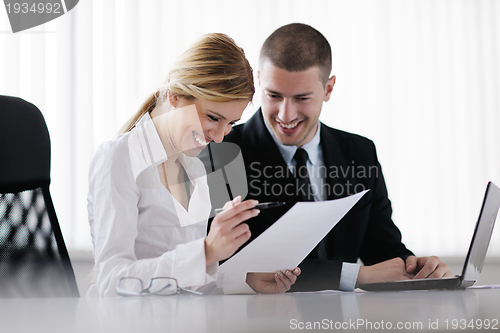 Image of business people in a meeting at office