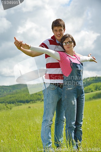 Image of romantic young couple in love together outdoor