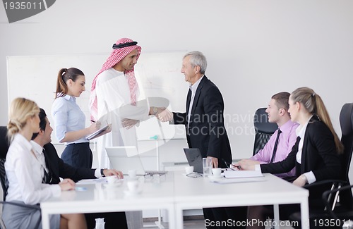 Image of Arabic business man at meeting