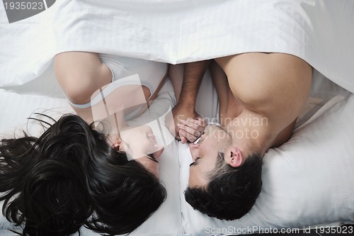 Image of young couple have good time in their bedroom