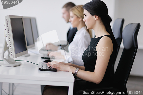 Image of business people group working in customer and help desk office