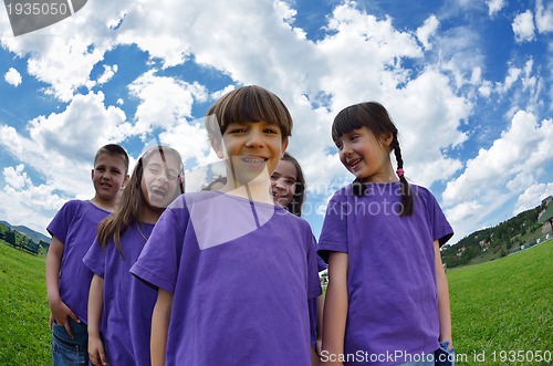 Image of happy kids group  have fun in nature