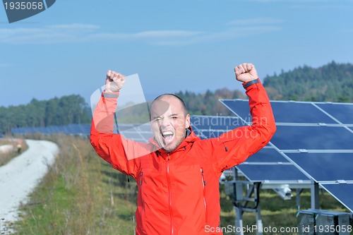 Image of Male solar panel engineer at work place