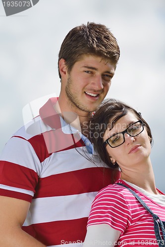 Image of romantic young couple in love together outdoor