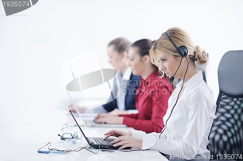 Image of business woman group with headphones