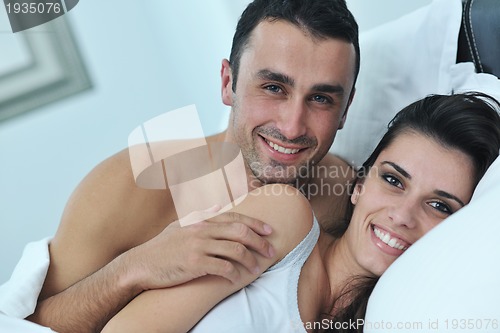 Image of young couple have good time in their bedroom