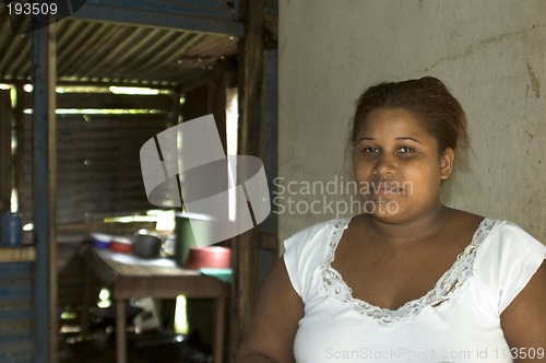 Image of woman in native house