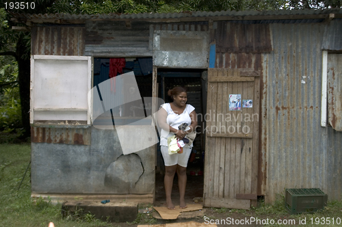 Image of woman in native house