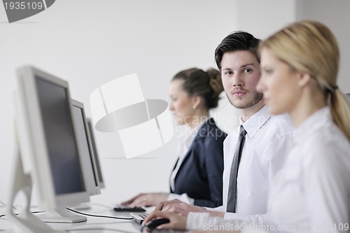 Image of business people group working in customer and help desk office