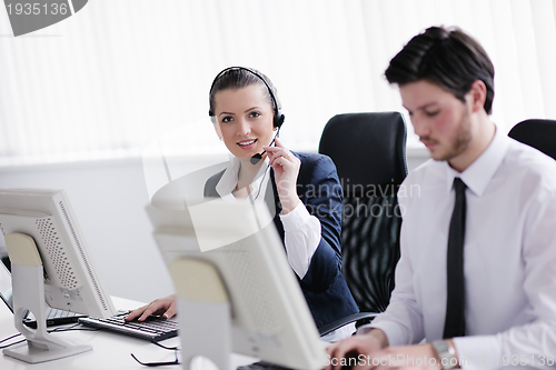 Image of business people group working in customer and helpdesk office