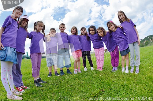 Image of happy kids group  have fun in nature