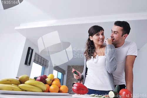 Image of young couple have fun in modern kitchen