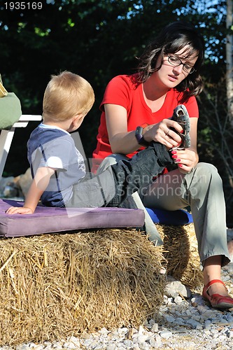 Image of woman and child have fun outdoor