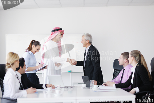 Image of Arabic business man at meeting