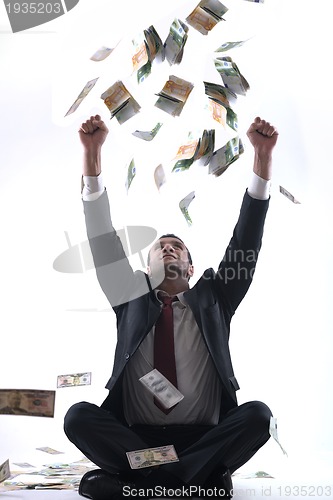 Image of Business man holding money