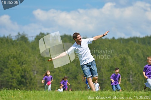 Image of happy kids group  have fun in nature