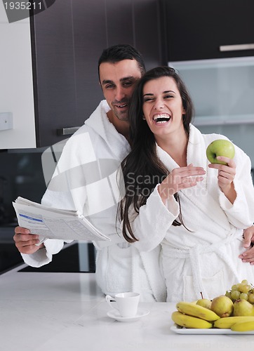 Image of young couple have fun in modern kitchen