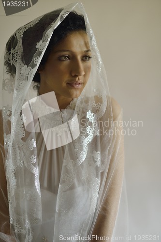 Image of Portrait of a beautiful woman dressed as a bride
