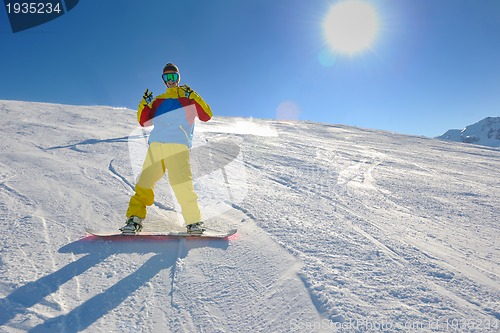 Image of skiing on fresh snow at winter season at beautiful sunny day
