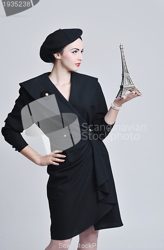 Image of beautiful young woman with paris symbol eiffel tower